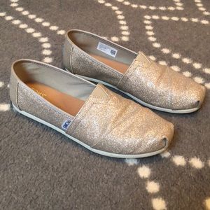 Tom’s rose gold flats.